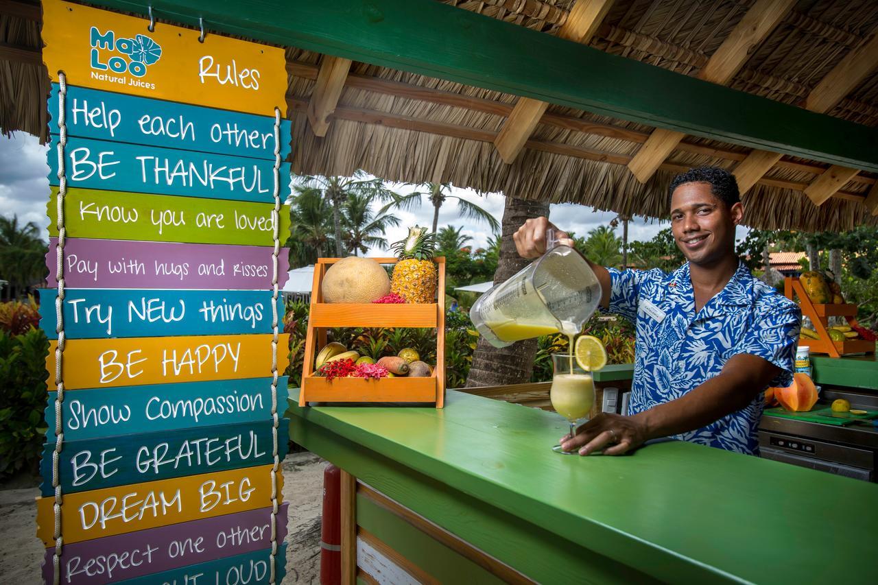 Catalonia Royal La Romana Adults Only Bayahibe Esterno foto A bartender at Sandals Resorts